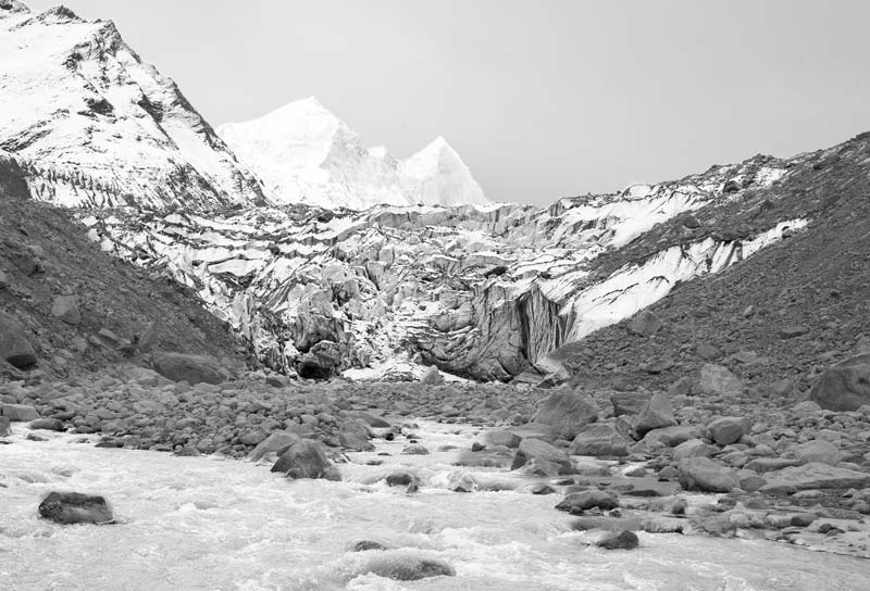 Bhagirathi river near Gangotri glacier with Bhagirathi Group of Peaks in the background in Uttarkashi district, Uttarakhand